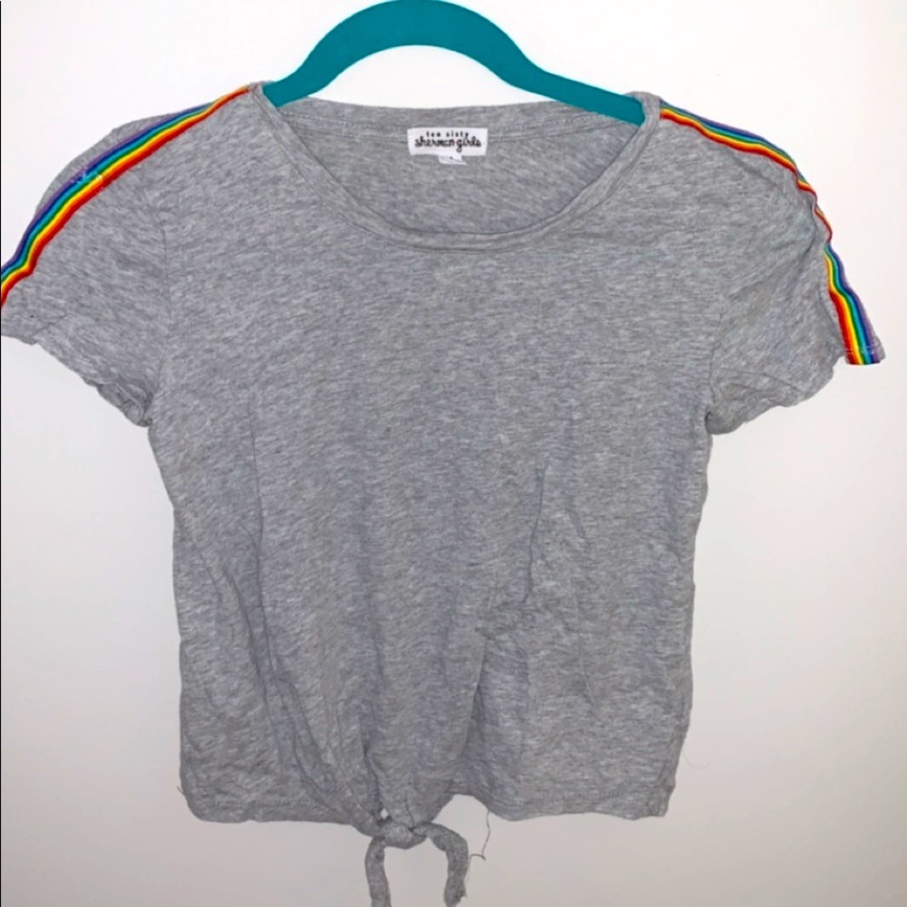 A gray tee shirt with rainbow strips. child’s M